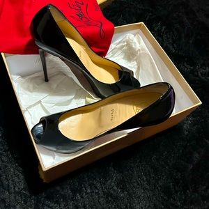 Christian Louboutin heels  , size 38 1/2 , black , sexy , excellent condition